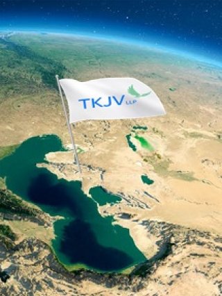 TKJV banner image representing the Earth (cropped to show the Middle East) on a blue background, with a flag "TKJV" planted in the Kazakhstan