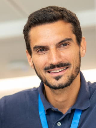 A male Technip Energies employee smiling