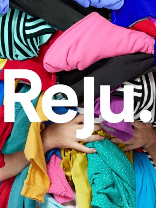 Picture of someone holding a pile of colorful clothes with the Reju logo written on top