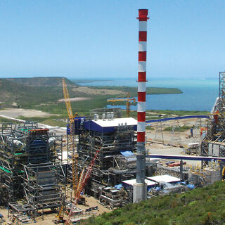 Aerial view of a mining facility near the coast