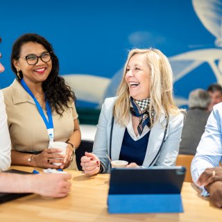 Technip Energies employees smiling and laughing