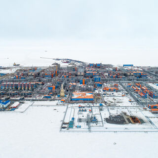 Aerial view of the Yamal complex, surrounded by snow, showcasing various facilities and equipment