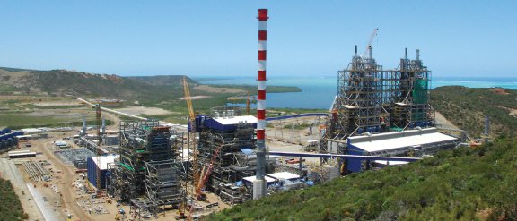 Aerial view of a mining facility near the coast