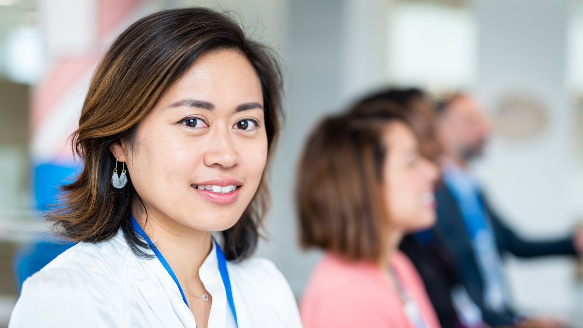 A woman smiling