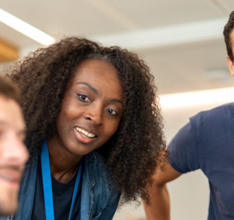 Three Technip Energies employees talking